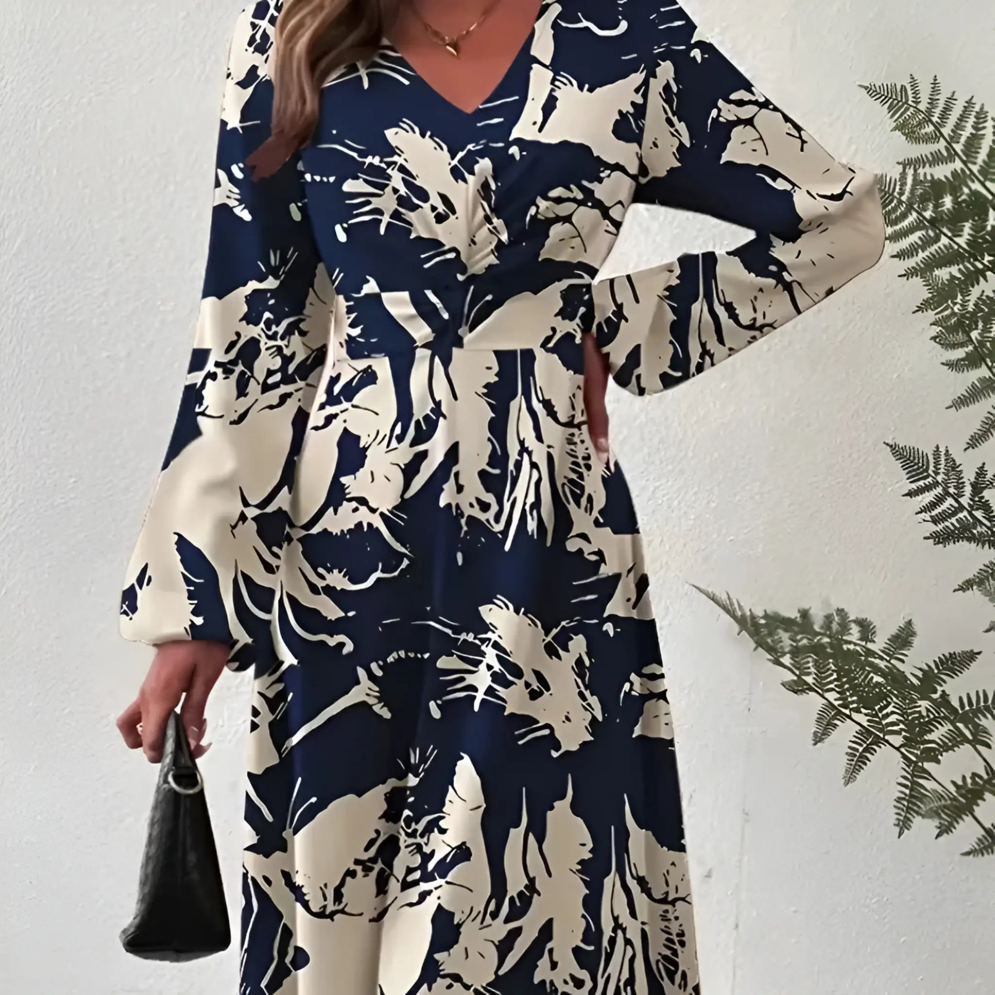 Elegante lange jurk met V-halslijn